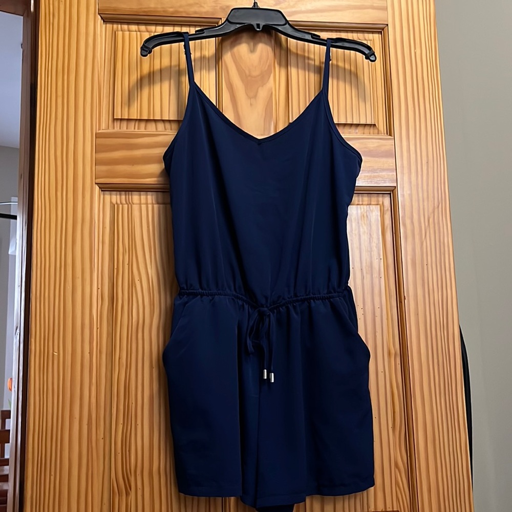 Navy blue romper with adjustable straps and tie at waist size L